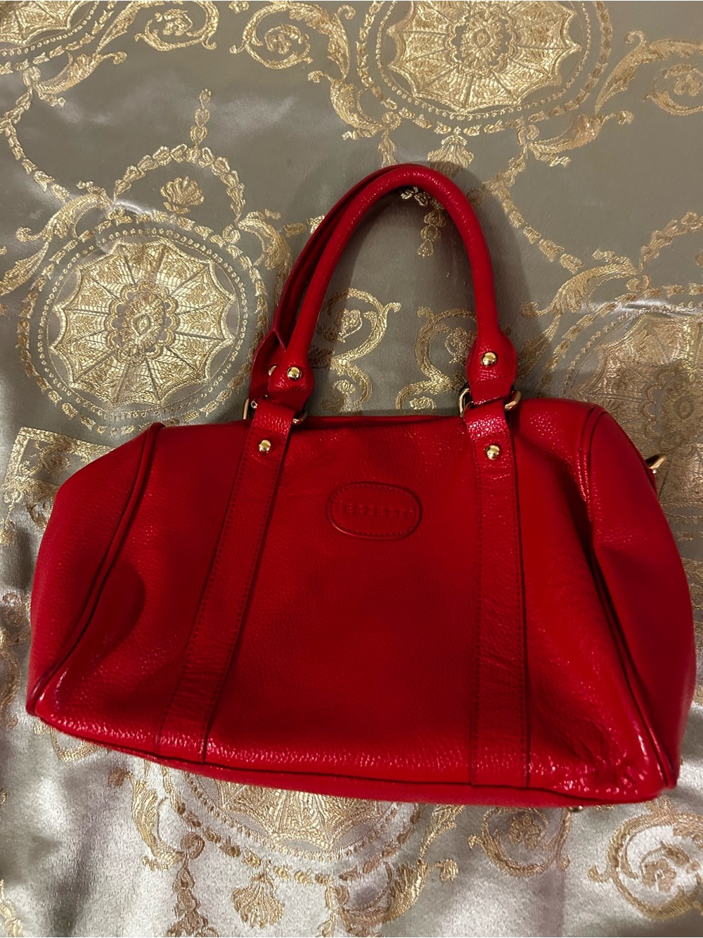 Terzetto Red Leather Satchel with Gold Accents